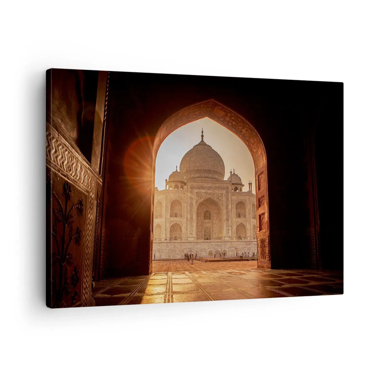 Canvastavla - Bild på duk - Taj Mahal i solljuset sett från portbågen - 70x50cm - Ett monument över överjordisk kärlek - Modern väggdekoration för vardagsrum och sovrum ARTTOR