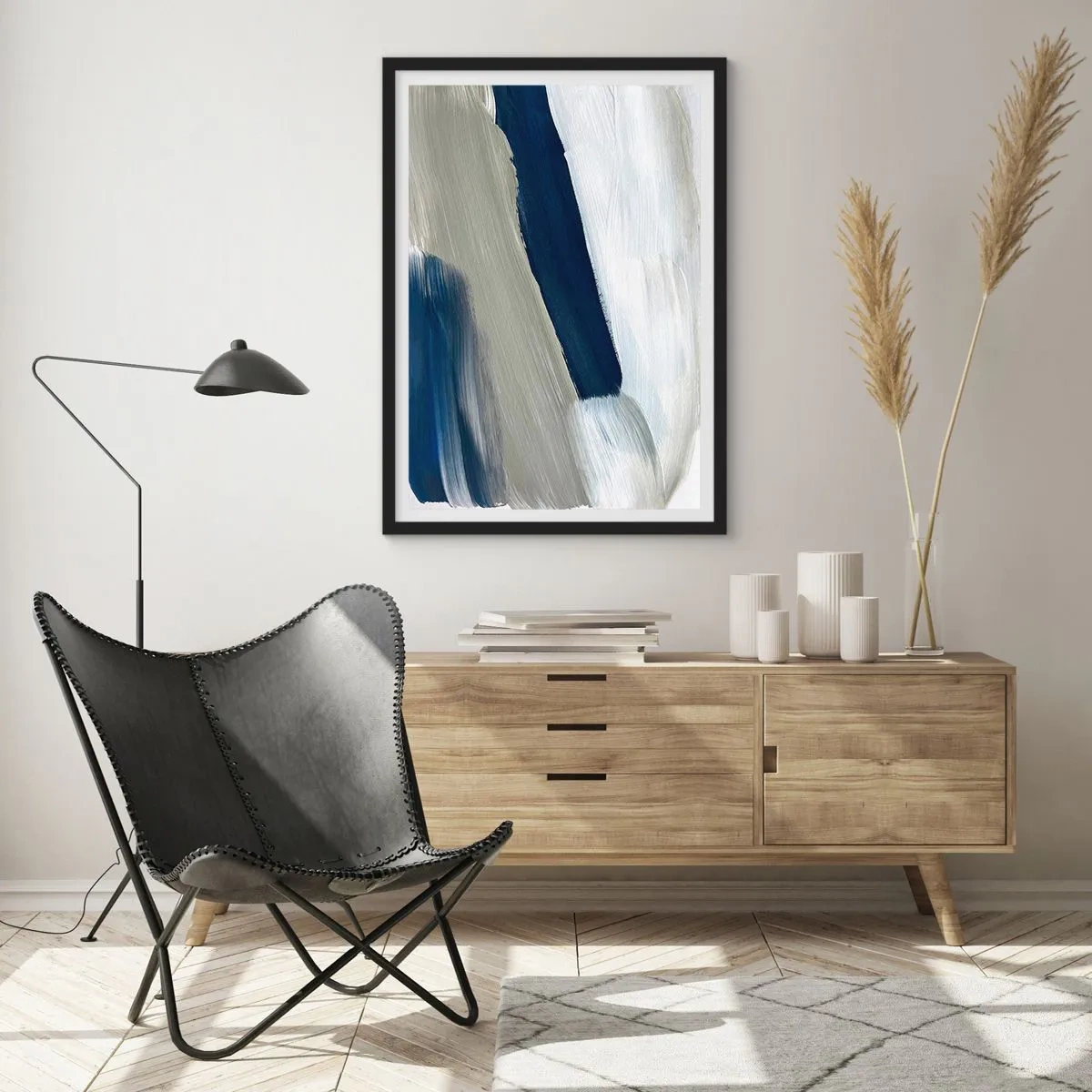 Affisch i svart ram - Abstrakta penseldrag i nyanser av marinblått - 50x70cm - Möte med vitt - Modern väggdekoration för vardagsrum och sovrum ARTTOR